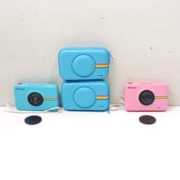 Pair Of Polaroid Snap Touch Compact Digital Cameras w/ Cases