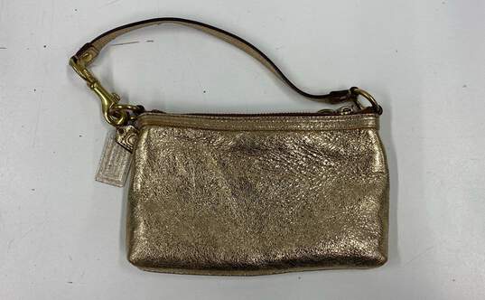 Coach Poppy Leather Small Wristlet Handbag Gold Metallic image number 2