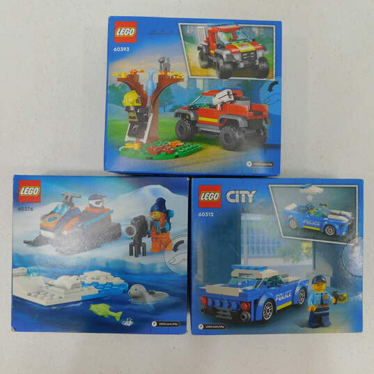 Sealed Lego City Police Car 4x4 Fire Truck Rescue & Arctic Explorer Snowmobile Building Toy Sets image number 2