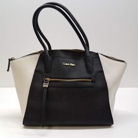 item grond Laboratorium Buy the Calvin Klein Saffiano Leather Key Satchel | GoodwillFinds