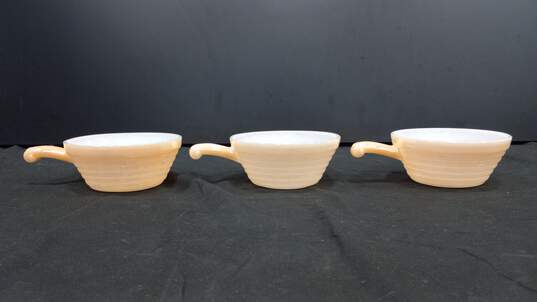 Bundle of 3 Peach Colored Fire King Ceramics Bowls w/ Handles image number 1