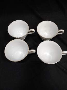 Bundle of 7 Wedgwood Bone China Plates w/ 4 Matching Tea Cups, Cream and Sugar Dish alternative image