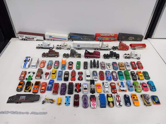Lot of Hot Wheels Cars and Semi Trucks image number 1