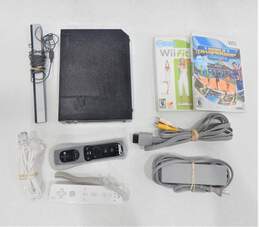 Nintendo Wii W/ 2 Games, 2 Controllers, 1 Nunchuk, Wii Fit Plus