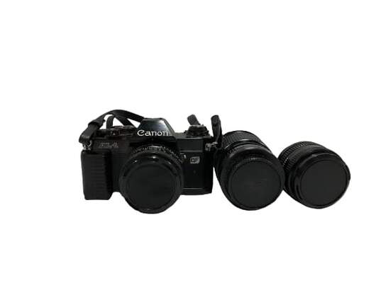 Canon AL-1 Film Camera w/ 3 Lenses [broken battery door] image number 3