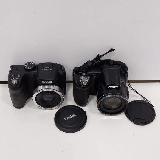 Pair Of Cameras: Nikon Coolpix L830 And Kodak Pixpro AZ252 DSLR Digital Cameras image number 1