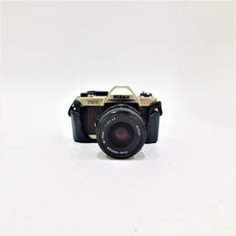 Nikon FM10 35mm Film Camera + Nikkor 35-70mm Lens