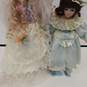 4pc. Bundle of Assorted Collectible Porcelain Dolls image number 5