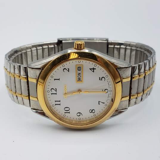 Buy the 7N43-9070 Men's Quartz Two-Tone Wristwatch with Day/Date on Dial |  GoodwillFinds