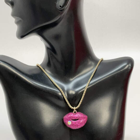 Designer Betsey Johnson Gold-Tone Hot Pink Glitter Lips Pendant Necklace image number 1