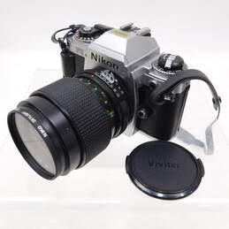 VNTG Nikon Brand FG Model 35mm Film Camera w/ Attached Case and Strap alternative image