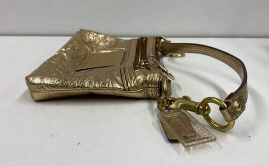 Coach Poppy Leather Small Wristlet Handbag Gold Metallic image number 5