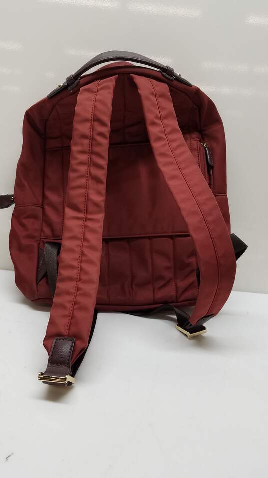 Buy the Michael Kors Red Backpack | GoodwillFinds