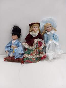 Bundle of 3 Assorted American & Japanese Themed Porcelain Dolls w/ Two Stands
