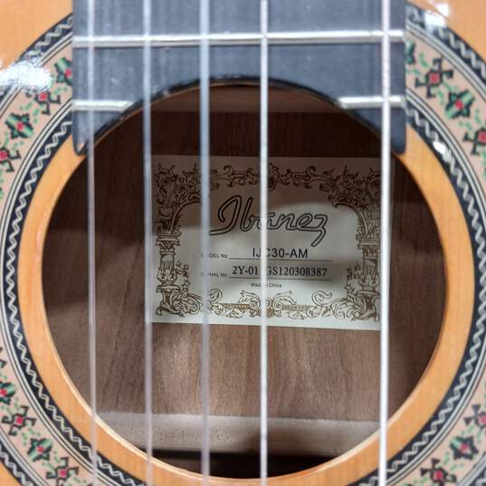 Brown Acoustic Guitar image number 4