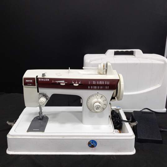Singer Sewing Machine in Case image number 1