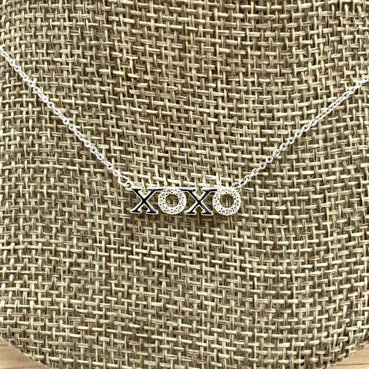 Designer Stella & Dot Silver-Tone XOXO Crystal Fashion Pendant Necklace image number 1
