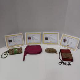 Authenticated 4pc Bundle of Women's Coach Wristlets and Wallets