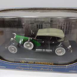 Bundle of 4 Vintage Signature Models Diecast Vehicles alternative image
