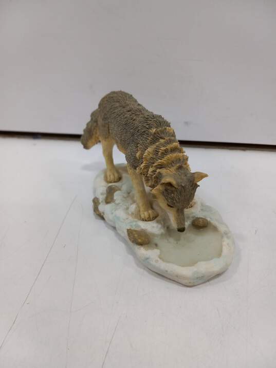 4pc Set of Wolf Figurines image number 4