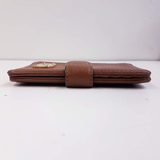 Michael Kors Pebbled Leather Passport Holder Tan image number 5