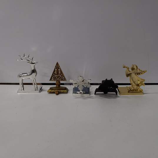 Bundle of 5 Assorted Christmas Stocking Hangers image number 2