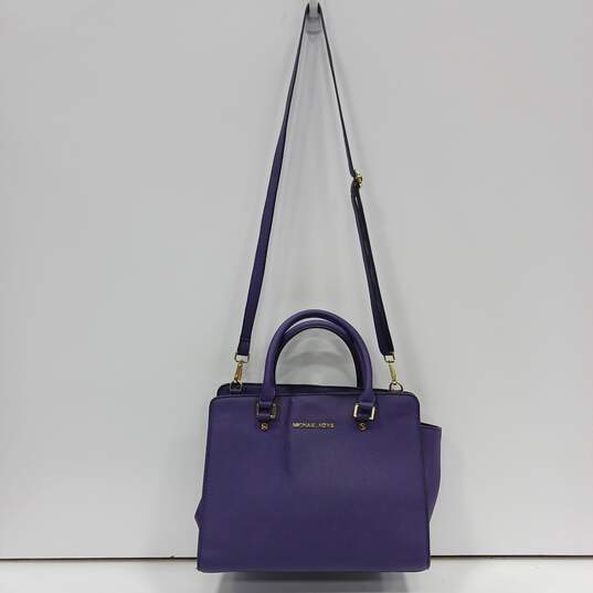 Women's Michael Kors Purple Crossbody Bag Purse image number 1