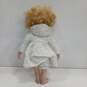 Vintage Porcelain Doll w/ White Faux Fur Coat image number 2