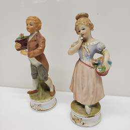 Set Of 2 VTG. Ardco Porcelain Figurines Boy W/Flowers + Girl W/Flower Basket