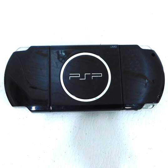 Sony PSP No Battery W/Games image number 9