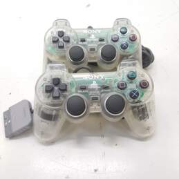 Sony PS1 controllers - Lot of 2, DualShock SPCH-1200 - Crystal