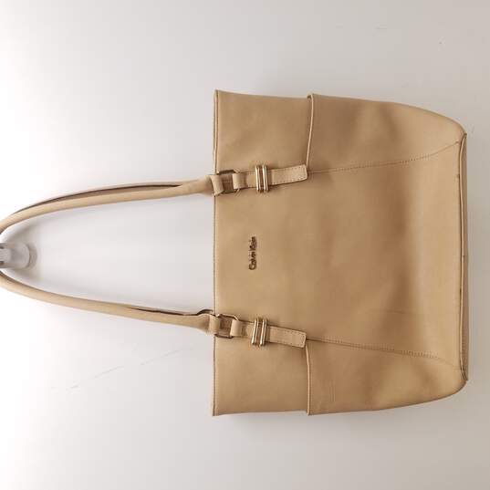 Calvin Klein All Tan Purse image number 1