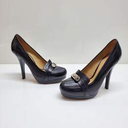 AUTHENTICATED WMNS COACH BLACK LEATHER TURNLOCK PUMPS SIZE 6