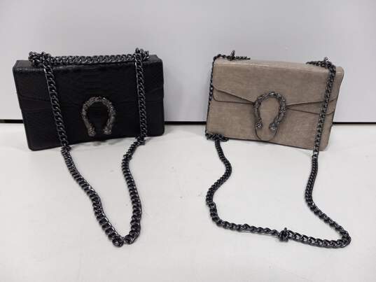 Pair of Women's Black & Tan Leather Purses image number 1