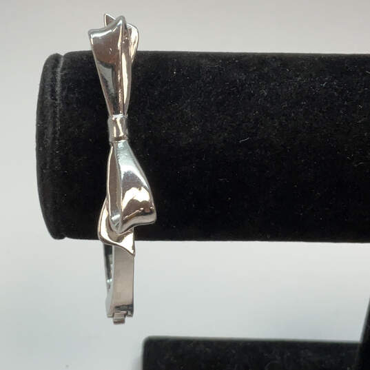Designer Kate Spade Silver-Tone Fashionable Bow Shape Bangle Bracelet image number 1