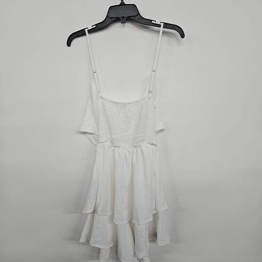 White Spaghetti Strap Bust Tie Romper image number 1