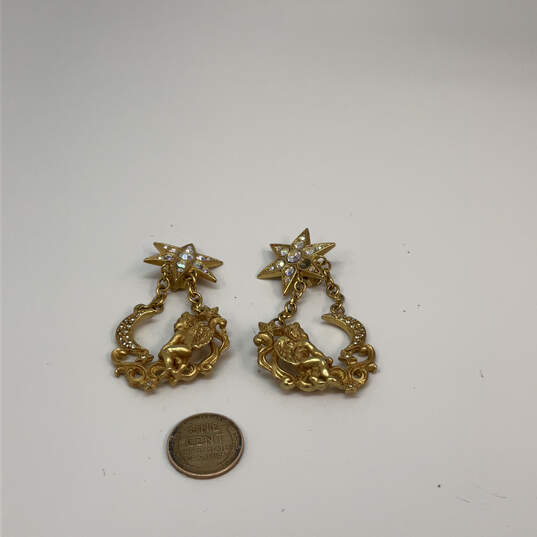 Designer Kirks Folly Gold-Tone Rhinestones Clip On Star Dangle Earrings image number 3