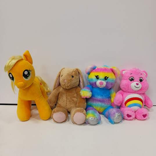 Bundle of 3 Assorted Build-A-Bear Stuffed Animals And 1 Care Bear Stuffed Animal image number 1