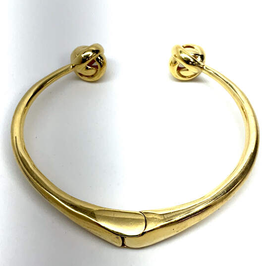 Designer Kate Spade Gold-Tone Hinged Knot Adjustable Cuff Bracelet image number 3
