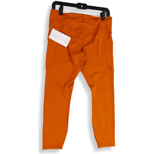 NWT Womens Orange Pockets Stretch Activewear Compression Leggings Size L image number 1