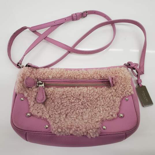 Coach Small Pink Shearling Leather Crossbody Bag AUTHENTICATED image number 1