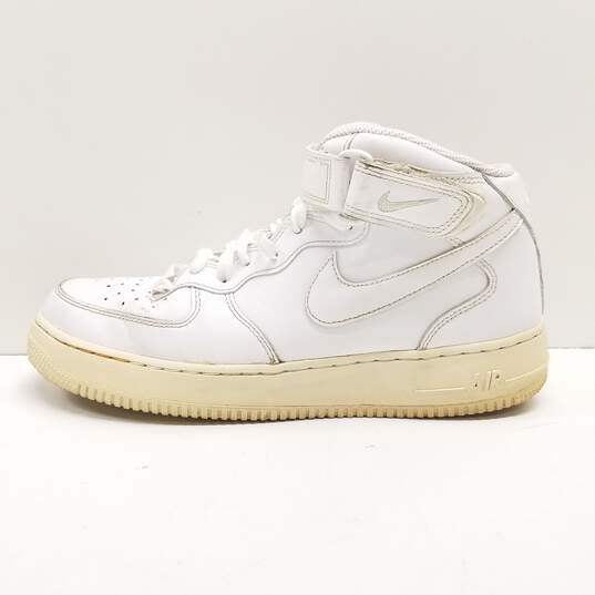 Nike Air Force 1 Mid Triple White Sneakers 315123-111 Size 9.5 image number 2
