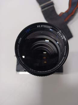 Canon AE-1 Program 35mm SLR Film Camera with Macro Focusing Zoom 70-210mm Bundle alternative image