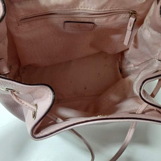 Kate Spade Rose Pink Pebbled Leather Drawstring Flap Backpack image number 4