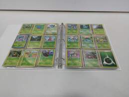 Pokemon Trading Cards in Sleeves in Binder
