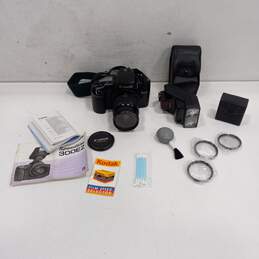 Bundle of Vintage Canon EOS Elan Camera with Accessories & Manuals