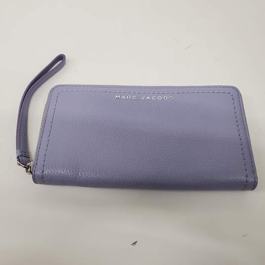 Buy the Marc Jacobs Purple Pebbled Leather Zip Around Wallet