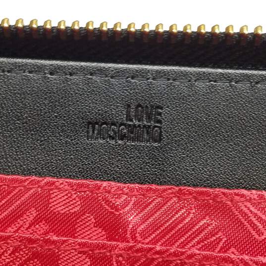Buy the AUTHENTICATED Love Moschino Metal Logo Black Leather Zip Around ...