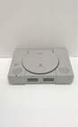 Sony Playstation SCPH-7001 console - gray >>FOR PARTS OR REPAIR<< image number 1
