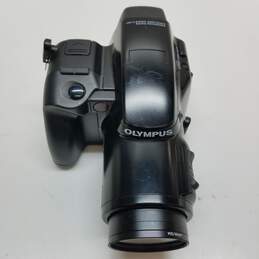 Olympus SLR 35mm is-1 camera w/35-135mm zoom lens